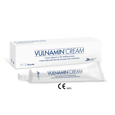 Packaging of VULNAMIN CREAM, which includes a tube and box with branding and medical symbols.