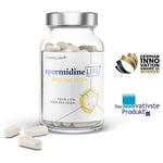 Bottle of spermidine LIFE supplement with capsules on a white background