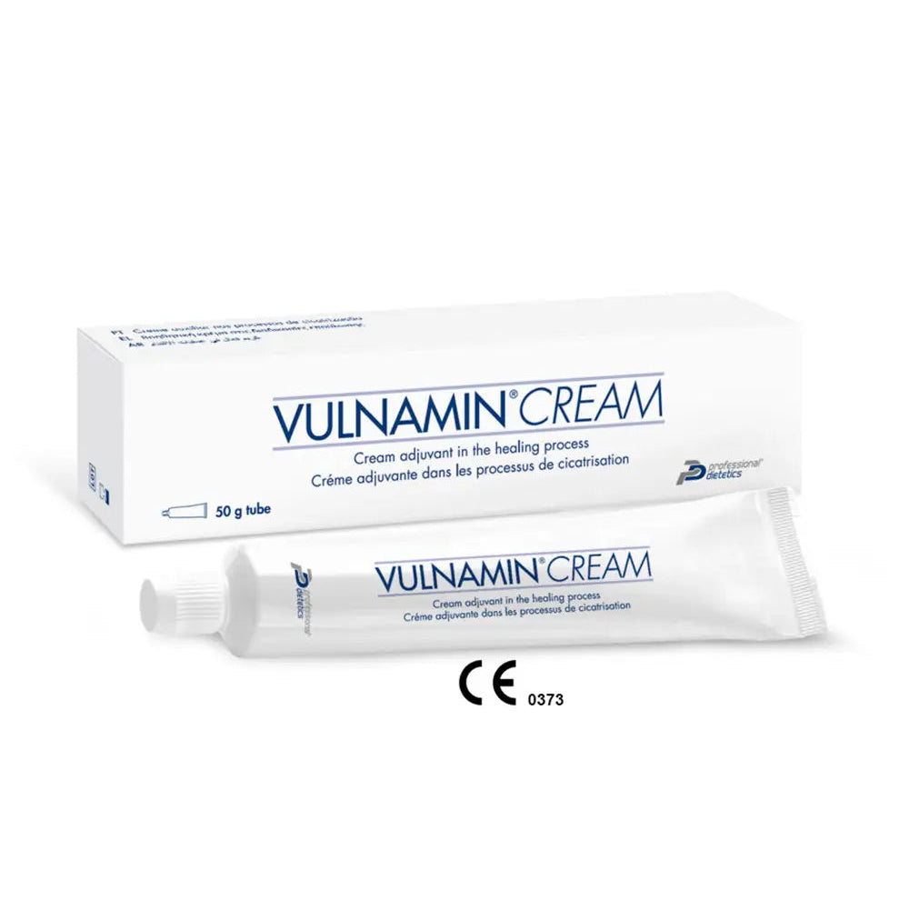 Packaging of VULNAMIN CREAM, which includes a tube and box with branding and medical symbols.