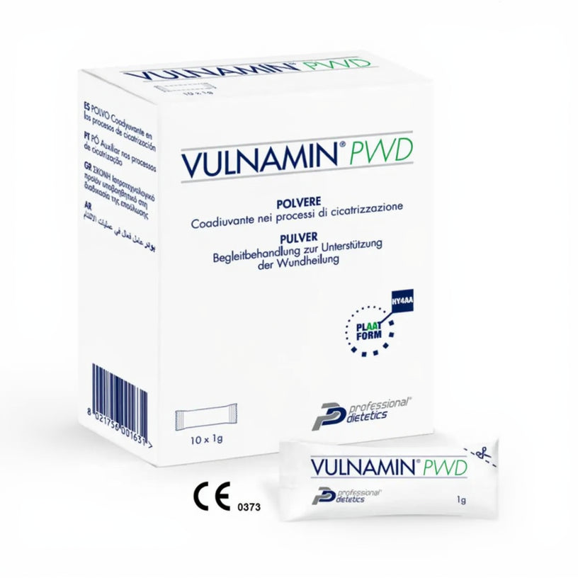 Packaging of VULNAMIN Pudră, which includes a box and a sachet showing the product name and its use for wound healing.