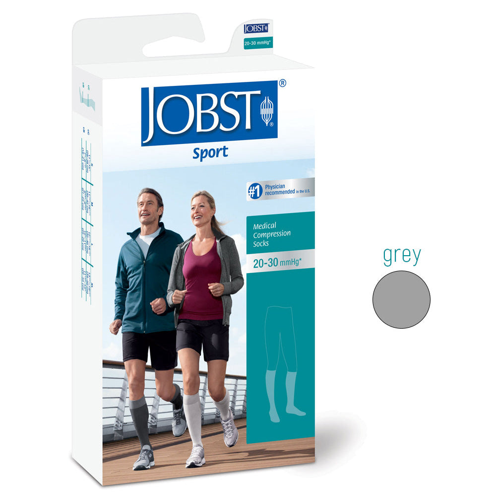 JOBST Sport compression sock packaging with a man and woman walking on a wooden deck.