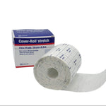 A roll of Cover-Roll Stretch medical tape next to its packaging box.