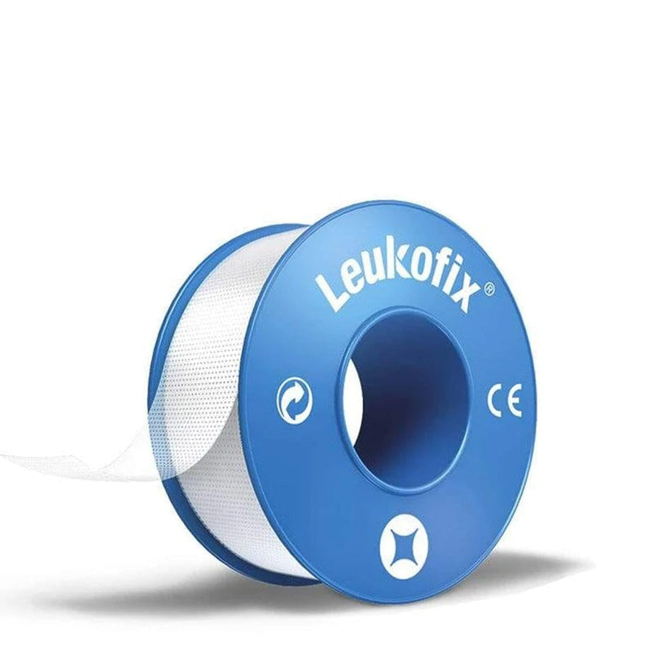 A roll of Leukofix medical tape with adhesive, blue in color, designed for securing medical dressings.