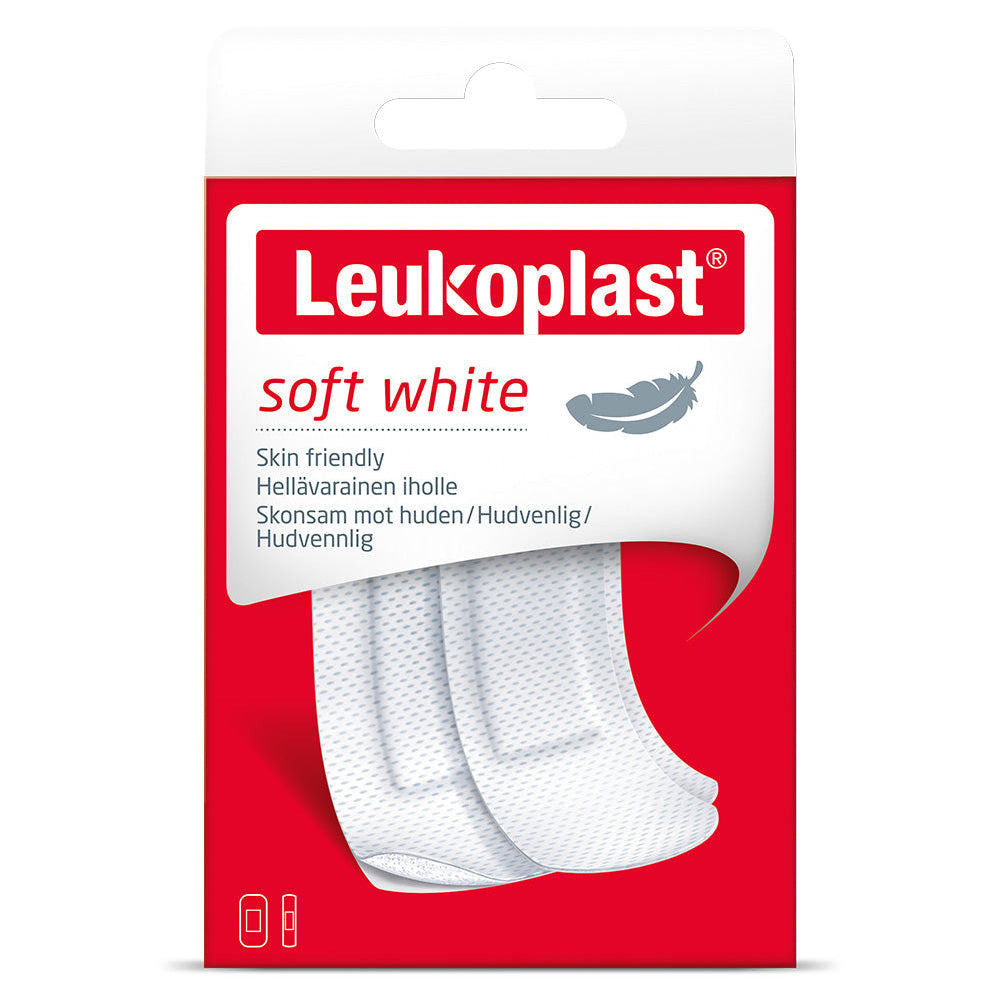 Packaging of Leukoplast soft white plasters for sensitive skin, showing the plasters outside the package and the brand name.